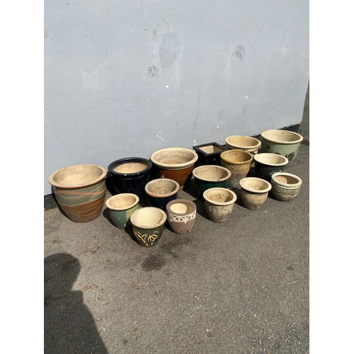 312 - A large selection of ceramic garden pots