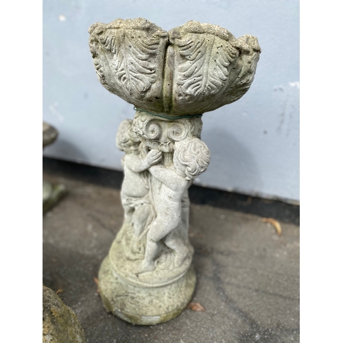 315 - A selection of stone garden ornaments