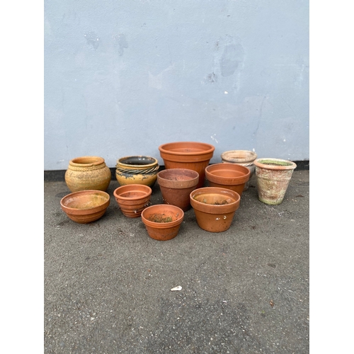 317 - A lot of miscellaneous terracotta pots.