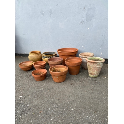 317 - A lot of miscellaneous terracotta pots.