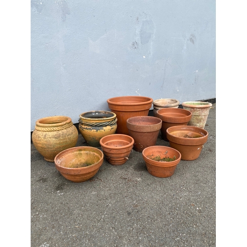 317 - A lot of miscellaneous terracotta pots.