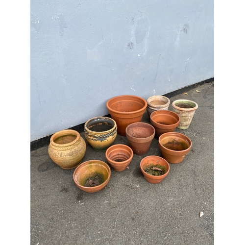 317 - A lot of miscellaneous terracotta pots.