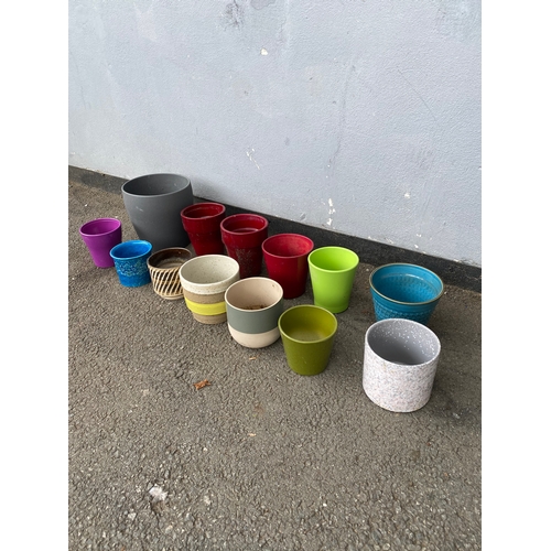 322 - An array of colourful Cache pots