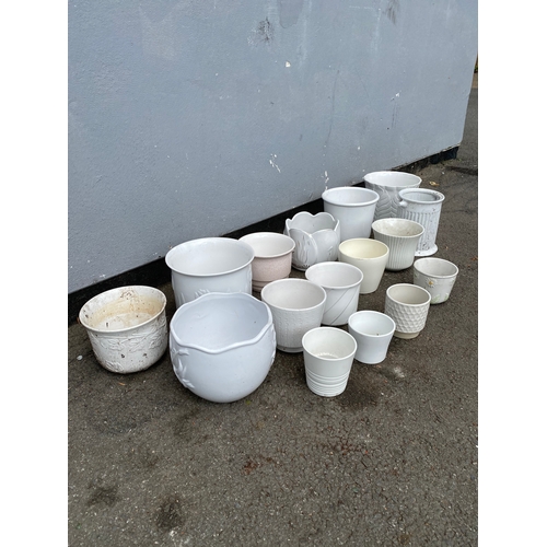 324 - A large selection of white cache pots