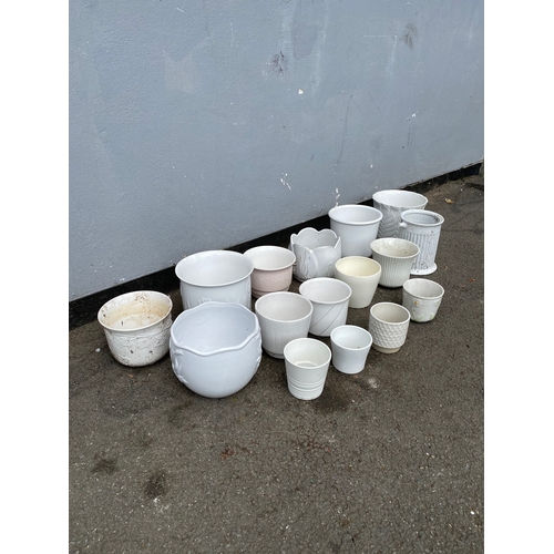 324 - A large selection of white cache pots