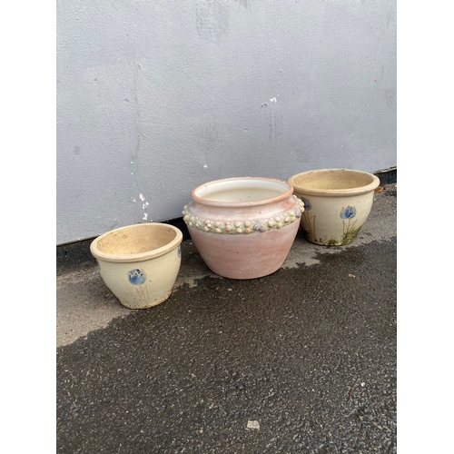 331 - Three floral design ceramic pots

Dimensions of largest for reference - 14