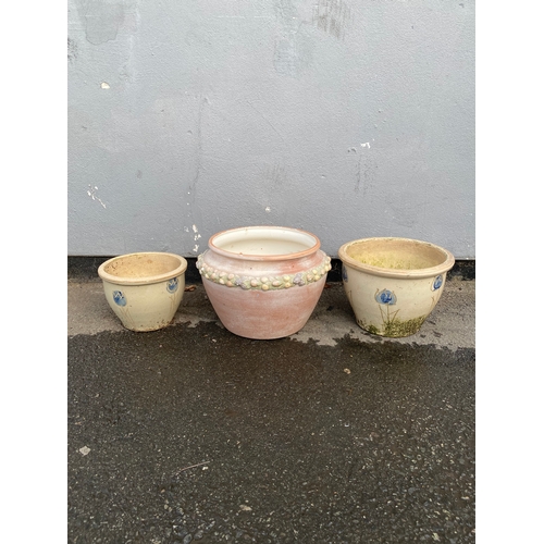 331 - Three floral design ceramic pots

Dimensions of largest for reference - 14