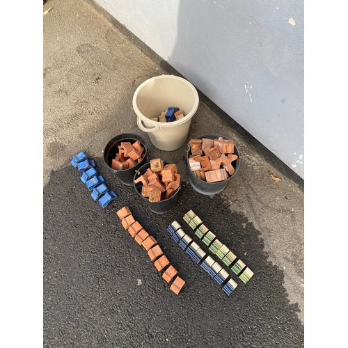 332 - Large lot of ceramic/terracotta pot feet.