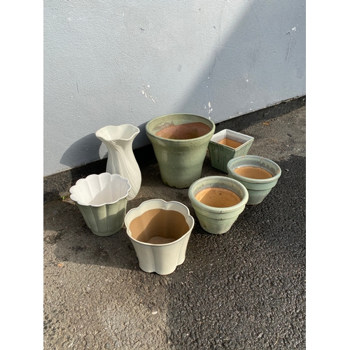 334 - Selection of various flower pots in green.