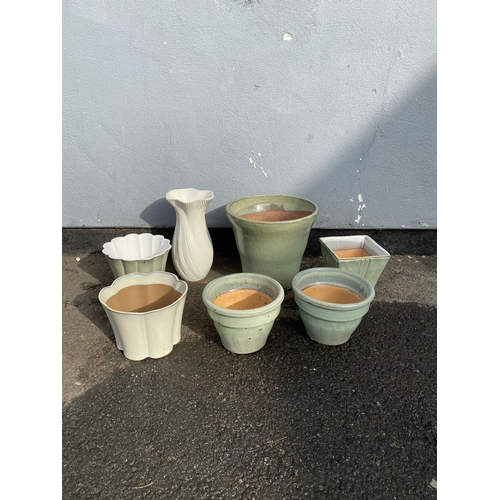 334 - Selection of various flower pots in green.