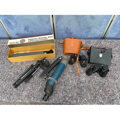 92 - A collection of vision magnifiers including two sets of binoculars