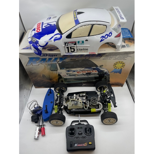 7 - Thunder Tiger Rally Game Peugeot 206 Rally Car Petrol RC with box & controller