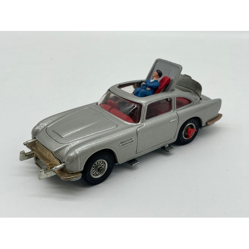 28 - Vintage Corgi Toys Man from U.N.C.L.E Oldsmobile Super 88 + James Bond  Aston Martin DB5