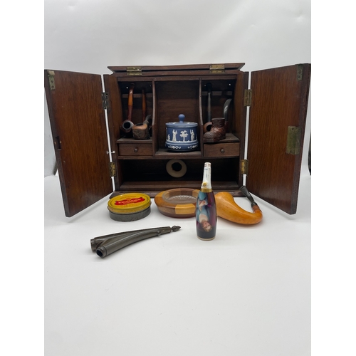 62 - Vintage Pipe Smokers Cabinet with collection of pipes and ephemera