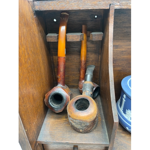 62 - Vintage Pipe Smokers Cabinet with collection of pipes and ephemera