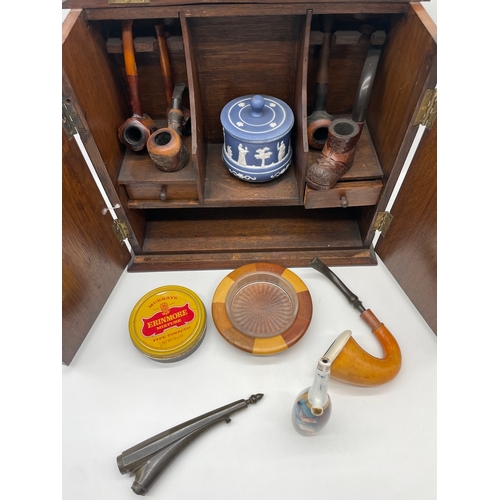 62 - Vintage Pipe Smokers Cabinet with collection of pipes and ephemera