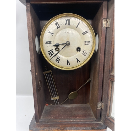 56 - Antique Oak cased wall clock