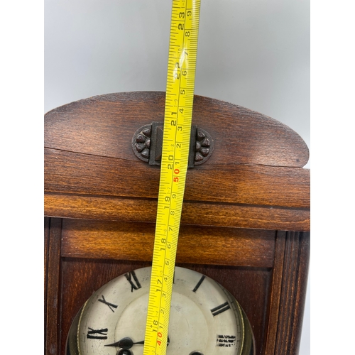 56 - Antique Oak cased wall clock