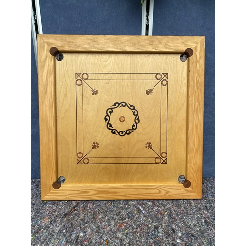 89 - Karum's handmade Carrom board. 

Dimensions - 36.5