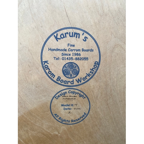 89 - Karum's handmade Carrom board. 

Dimensions - 36.5