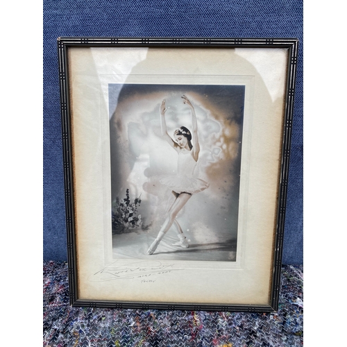 409 - A signed print of a young ballerina 

Dimensions - 8