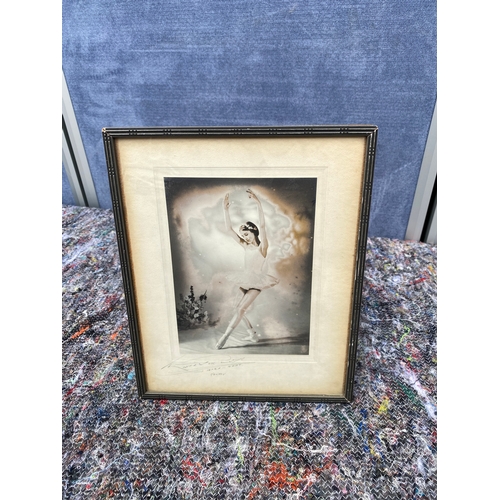 409 - A signed print of a young ballerina 

Dimensions - 8