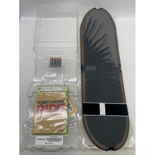 47 - brand new in box Xbox Tony Hawk Ride complete with skateboard controller and sealed game