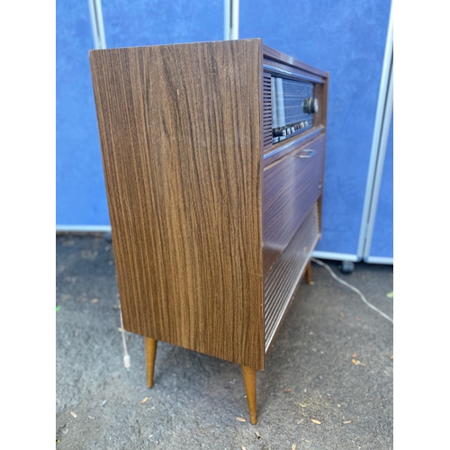 153 - Vintage Grundig stereo console.

Dimensions - 32