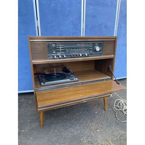 153 - Vintage Grundig stereo console.

Dimensions - 32