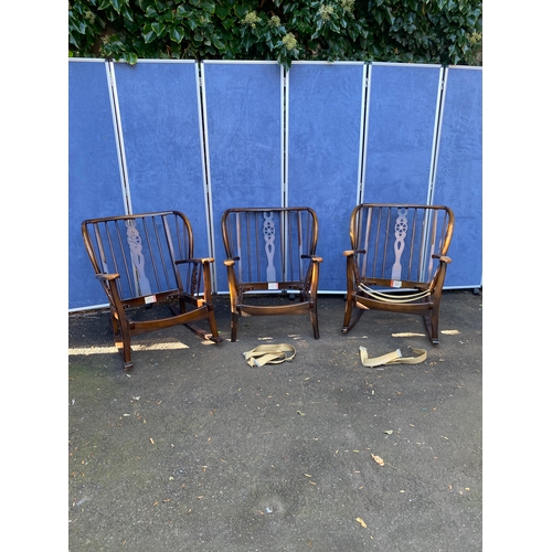 156 - A set of three wheel back arm chairs (Two are rocking chairs).

Dimensions - 26.5