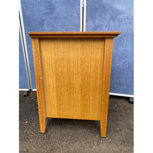 161 - Single modern oak bedside table with three drawers. 

Dimensions - 19