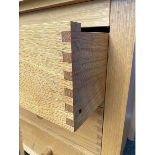 161 - Single modern oak bedside table with three drawers. 

Dimensions - 19