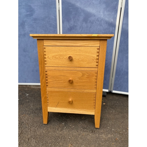 161 - Single modern oak bedside table with three drawers. 

Dimensions - 19