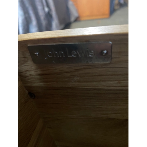 168 - John Lewis Oak bedside table with three drawers. 

Dimensions - 18