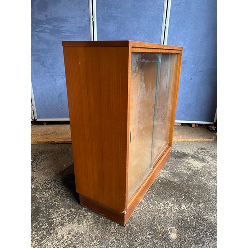 170 - Teak glass front display bookshelf. 

Dimensions - 27