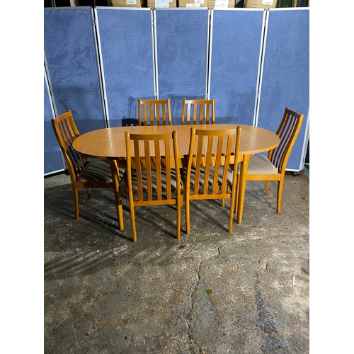 174 - Extendable dinning table and six chairs. 

Please see images for dimensions.