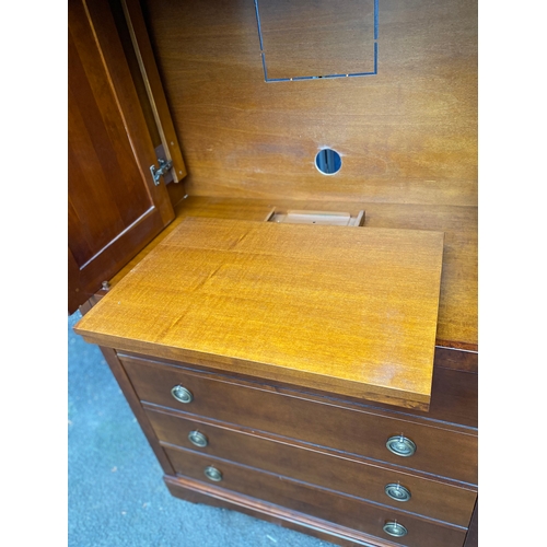 175 - Large French TV cabinet with four drawers. Has pull out base for TV which does swivel and retractabl... 