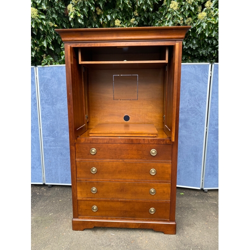 175 - Large French TV cabinet with four drawers. Has pull out base for TV which does swivel and retractabl... 