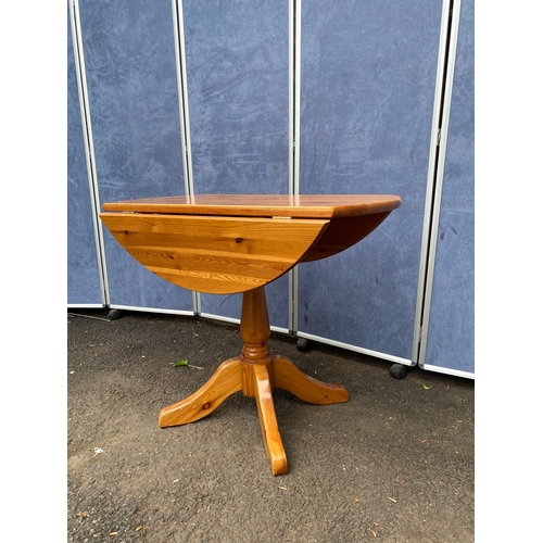 176 - Pine drop leaf table and two chairs. 

See images for all dimensions.