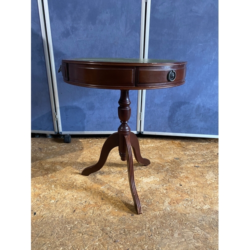 182 - Three drawer circular barrel side table with inlaid green leather

Dimensions - 24