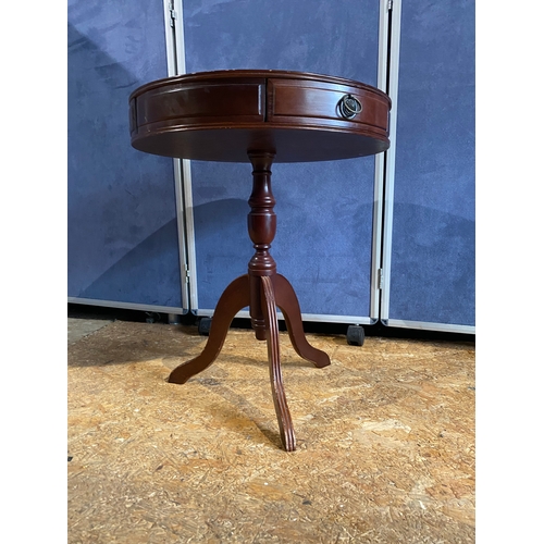 182 - Three drawer circular barrel side table with inlaid green leather

Dimensions - 24