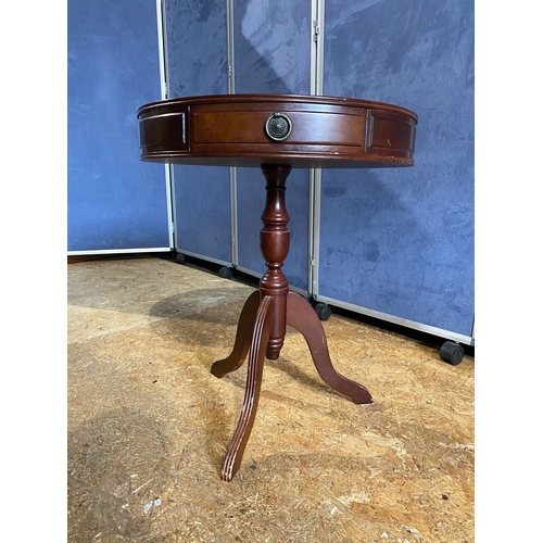 182 - Three drawer circular barrel side table with inlaid green leather

Dimensions - 24