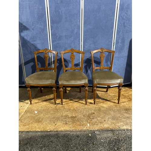 205 - A trio of antique upholstered parlour/side chairs.