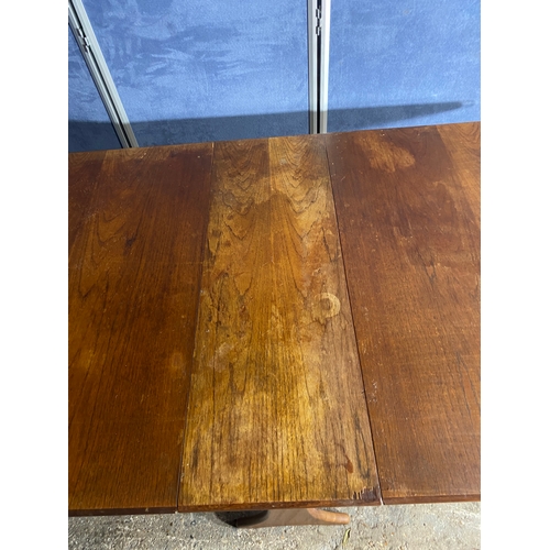 213 - Mid century drop leaf table.

Please see images for dimensions.