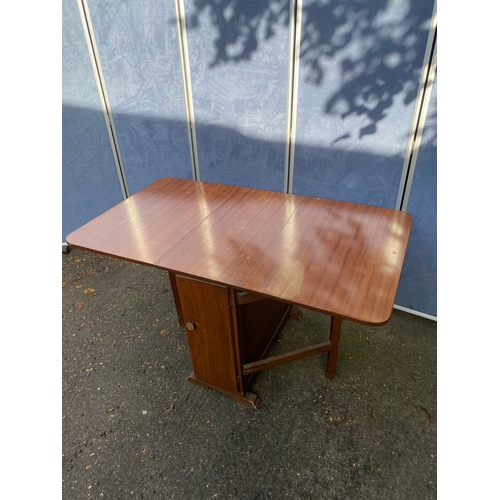 219 - Mahogany drop leaf table with storage area. 

Please see images for dimensions.