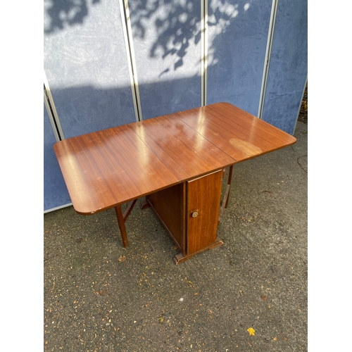 219 - Mahogany drop leaf table with storage area. 

Please see images for dimensions.