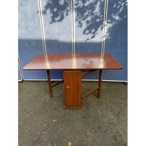 219 - Mahogany drop leaf table with storage area. 

Please see images for dimensions.