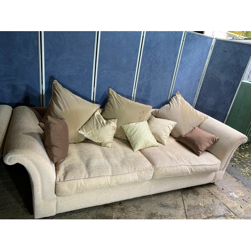 235 - Two large three seater upholstered sofas. 

Dimensions - 31