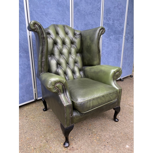 240 - Green Chesterfield style button back armchair. 

Dimensions - 36