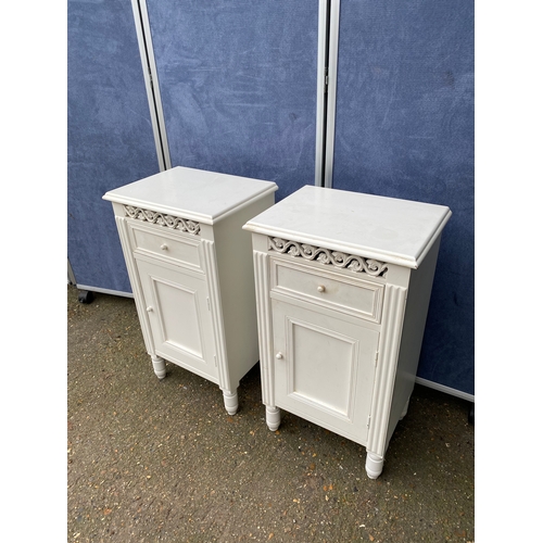 246 - A matching pair of bedside tables. 

Dimensions - 11